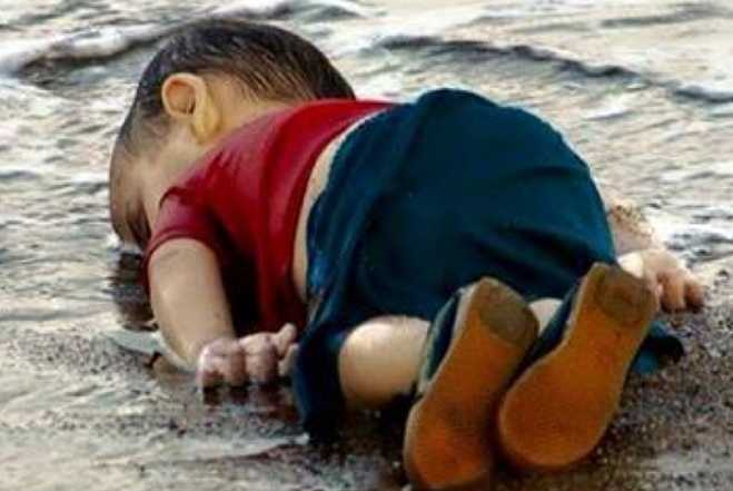 https://cdn.popdust.com/wp-content/uploads/2015/09/Dead-Syrian-Boy-Turkish-Beach-Photo_2015-09-03_23-15-25.jpg